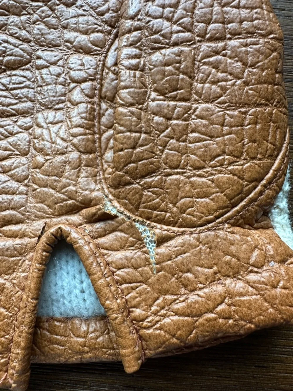 vintage Aris Novakid leather gloves featuring a gold buckle accent